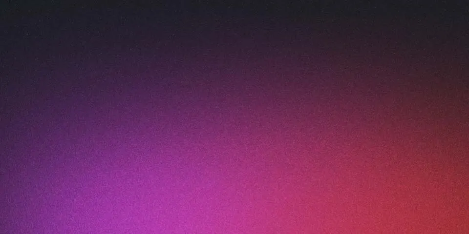 Illuminated city skyline at night with reflections on water