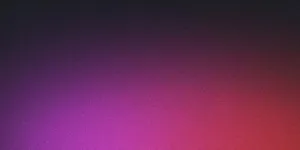 Illuminated city skyline at night with reflections on water